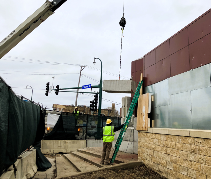 Worker with a crane at MDC building