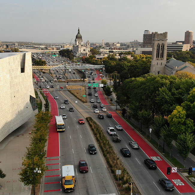 Street with vehicles and a Metro Transit bus