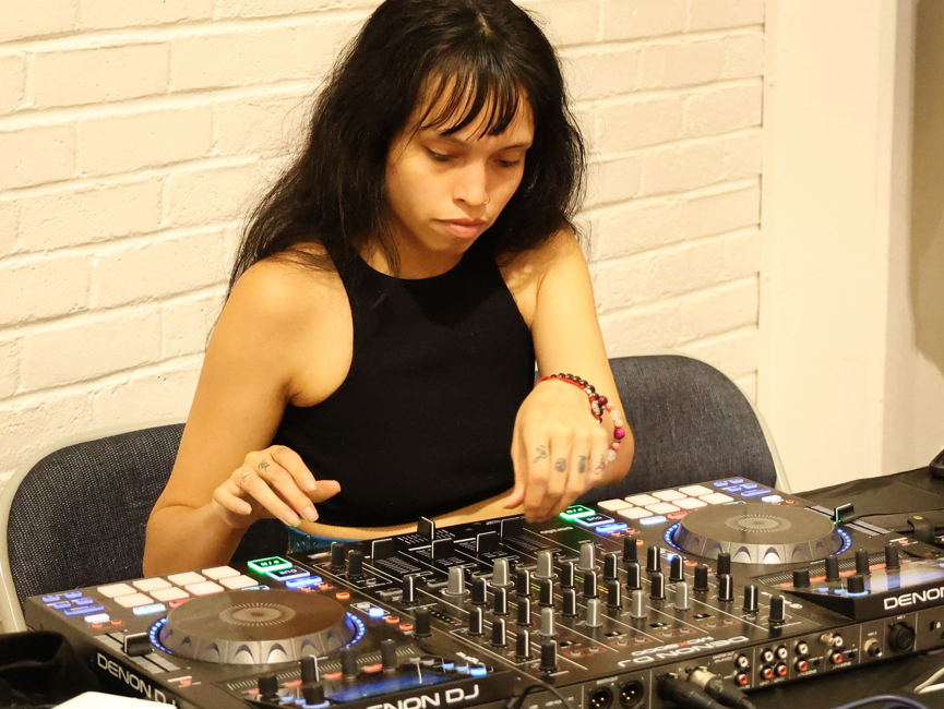 DJ performing at event. Photo by desgoproductions.