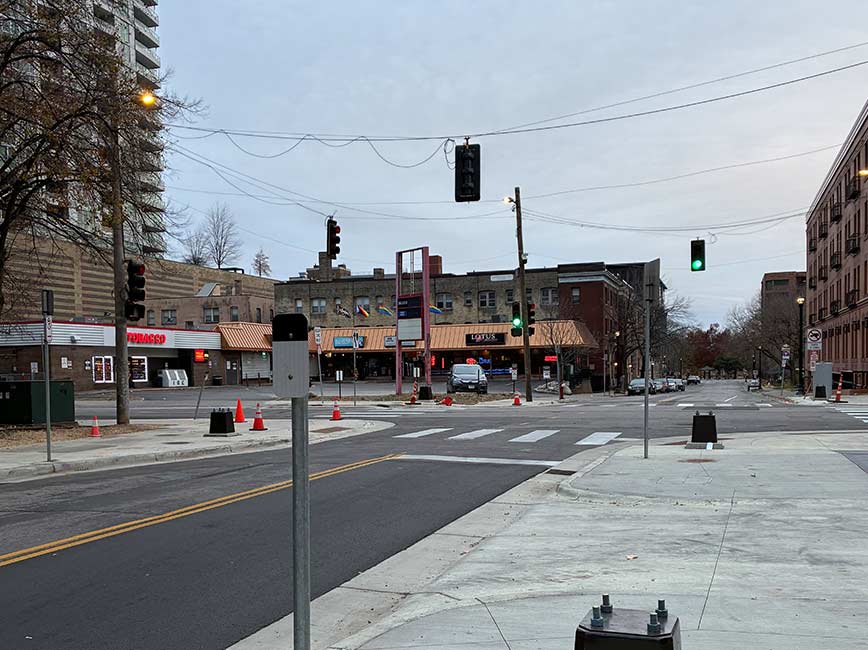 Biker riding along on a two-way protected bike trail