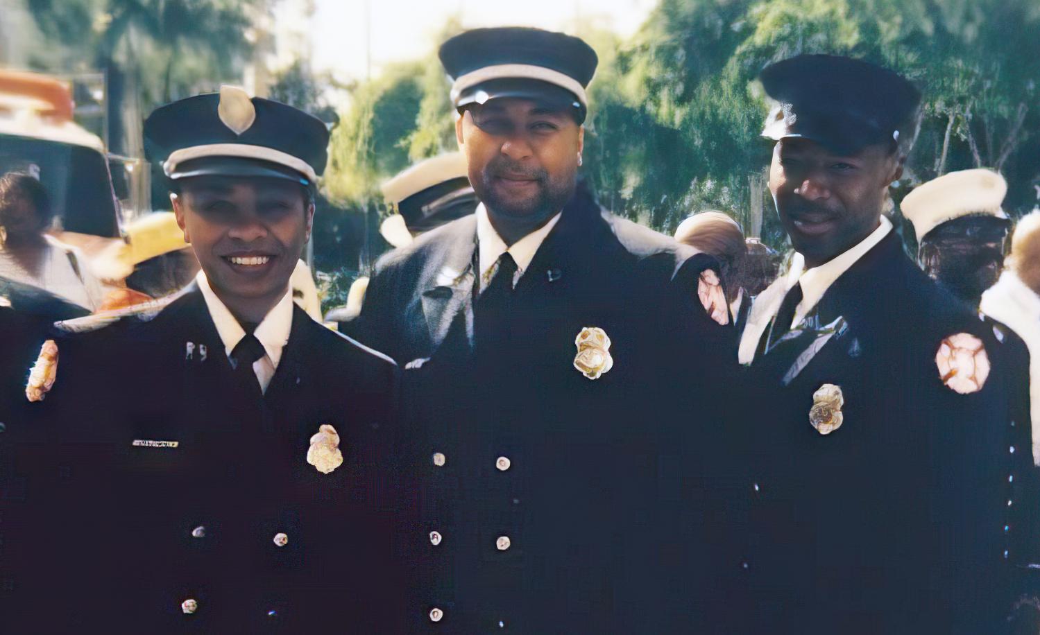 Minneapolis Assistant Fire Chief Melanie Rucker, Chief Bryan Tyner, and FMO Charles Rucker at the International Association of Black Professional Firefighters Conference in 2005.