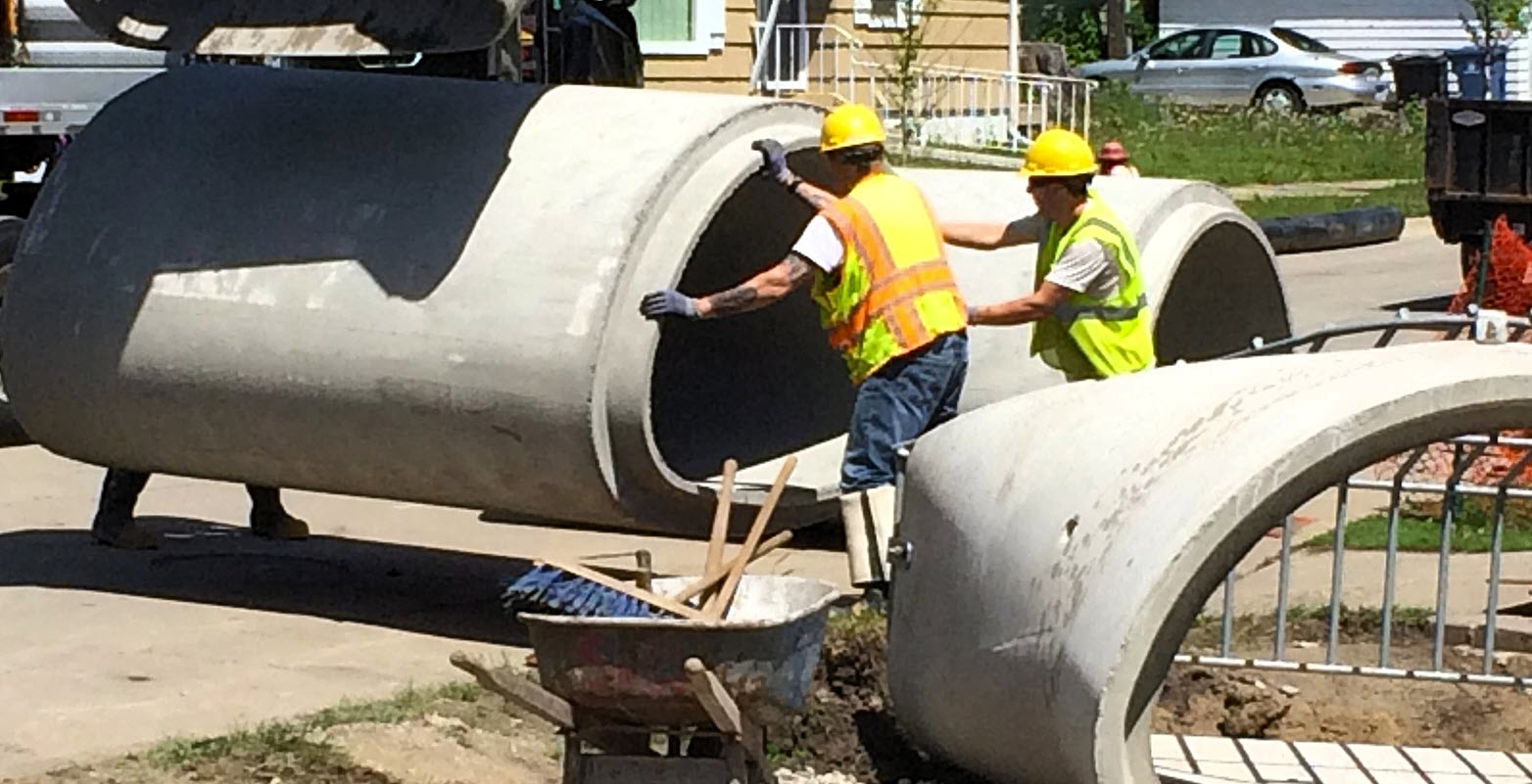 Storm pipe being installed.
