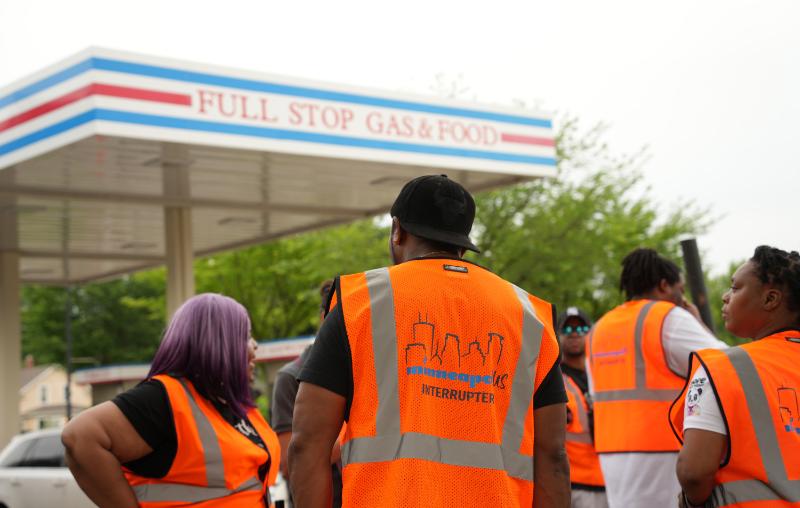 A group of violence interrupters wearing orange vests in North Minneapolis.