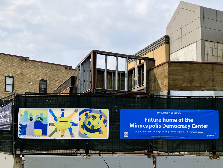 New signs at Minneapolis Democracy Center building