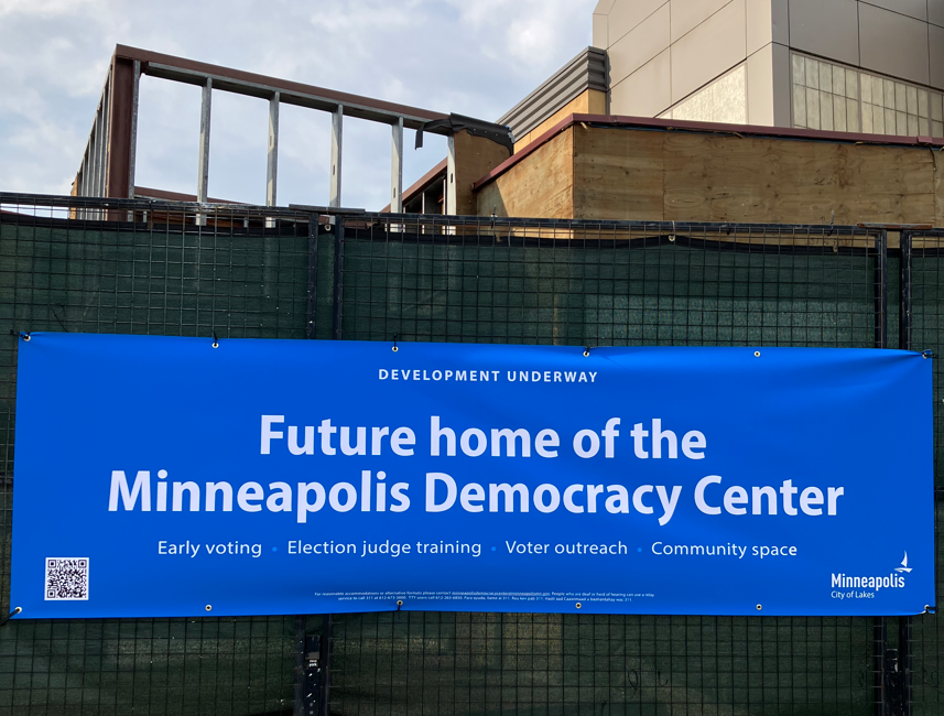 New signs at Minneapolis Democracy Center building