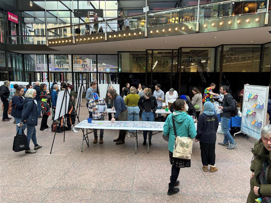 People participating in an engagement event on Nicollet Mall