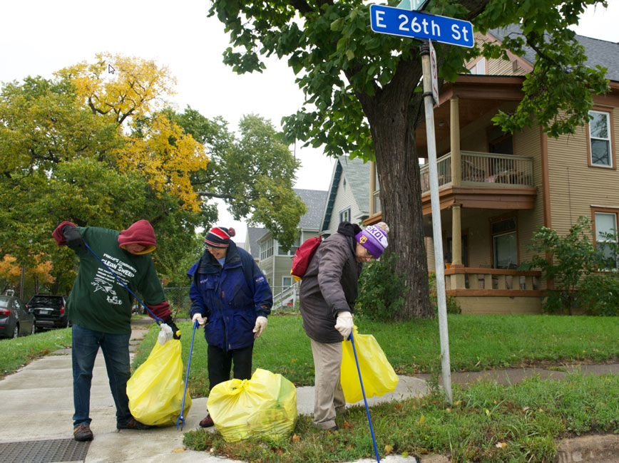 residents picking up litter