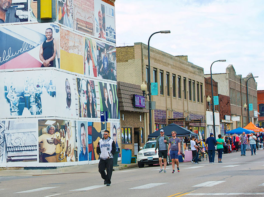 People walking through Open Streets Minneapolis 2019 in North Minneapolis.