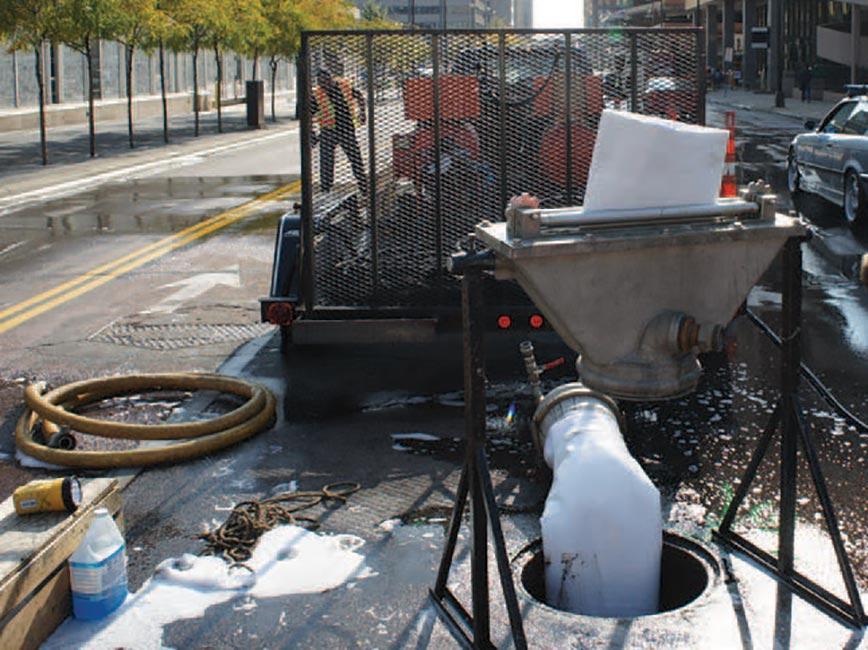 Public Works working on a downtown pipe lining project.