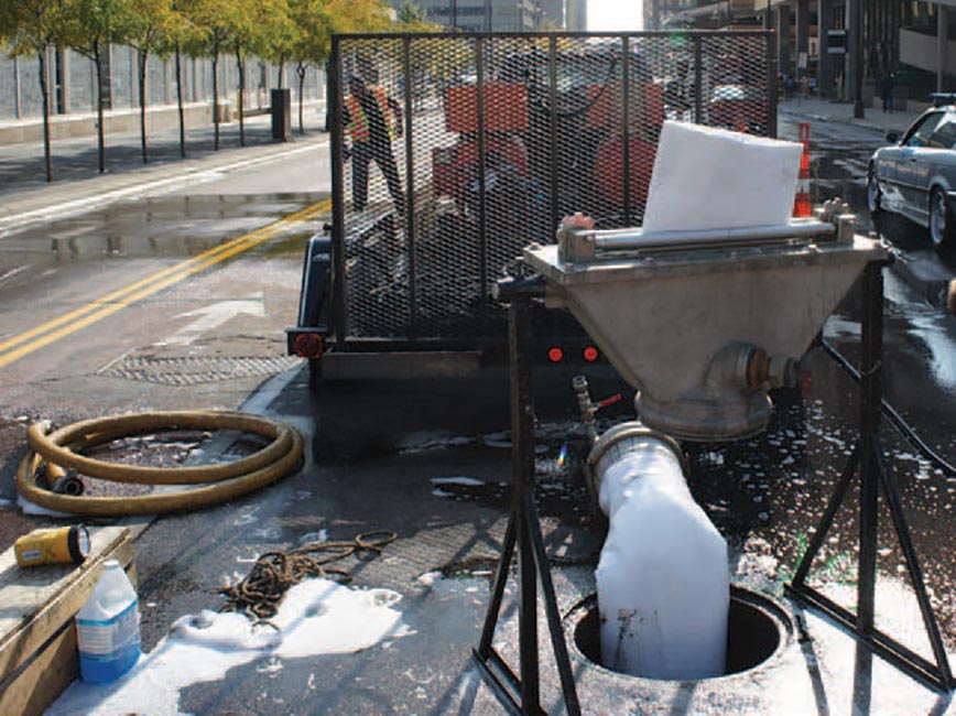Public Works working on a downtown pipe lining project.