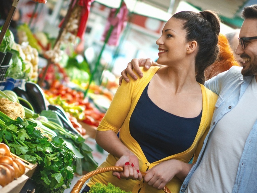 People shopping in farmers market