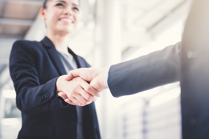 Two people shaking hands