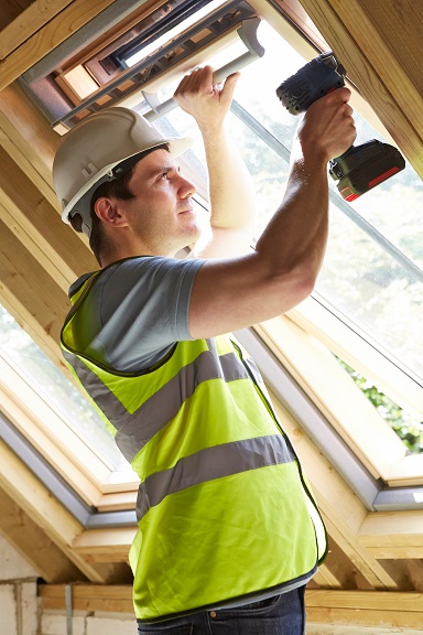 carpenter working inside house