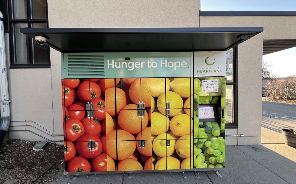 Set of food lockers with images of fruits and vegetables with a sign that says Hunger to Hope