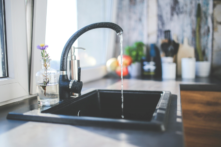 kitchen sink with water running