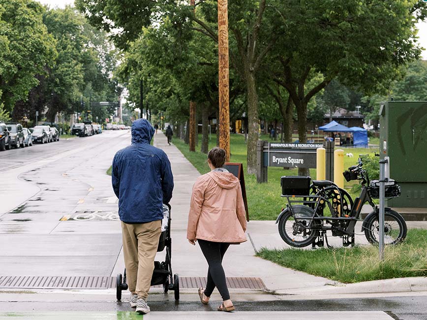 People walking with a stroller